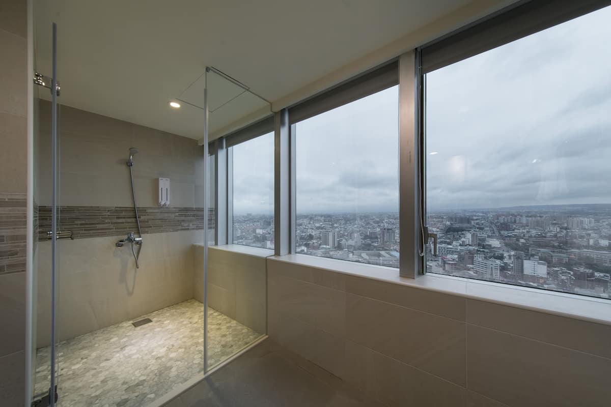 family triple room (not applicable for travel subsidies) | bathroom | shower, rainfall showerhead, hair dryer, slippers