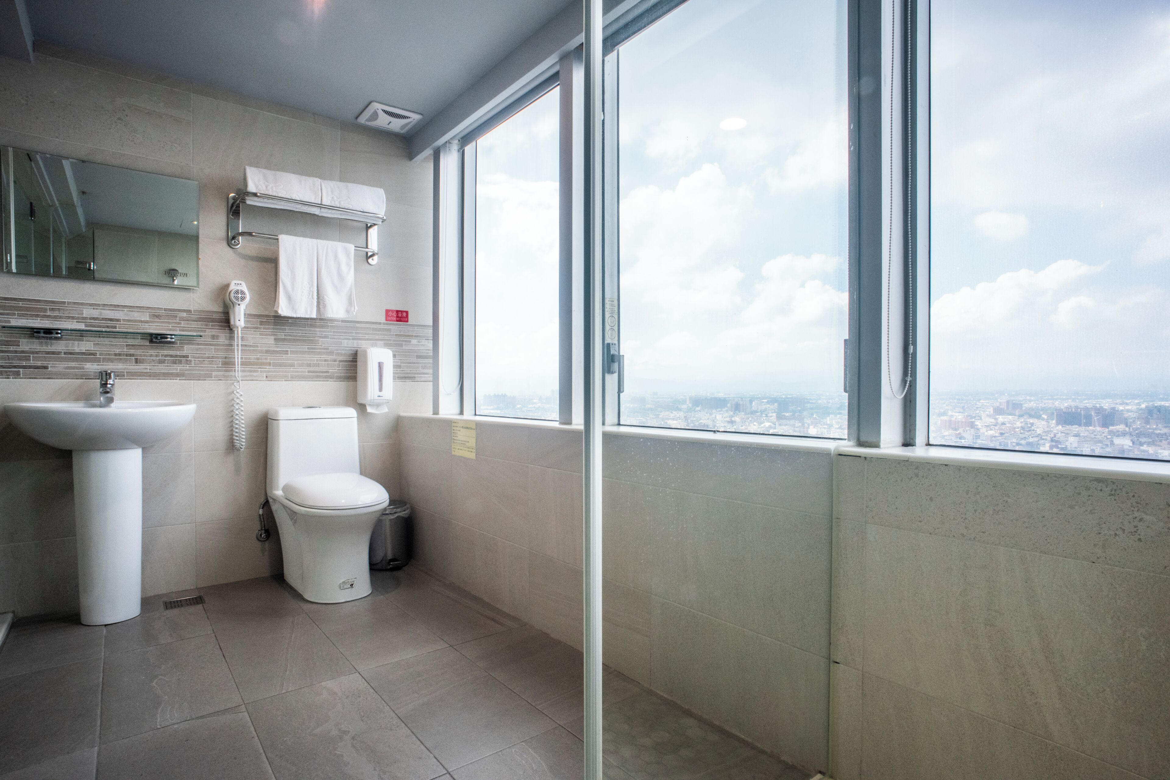 shower, rainfall showerhead, hair dryer, slippers