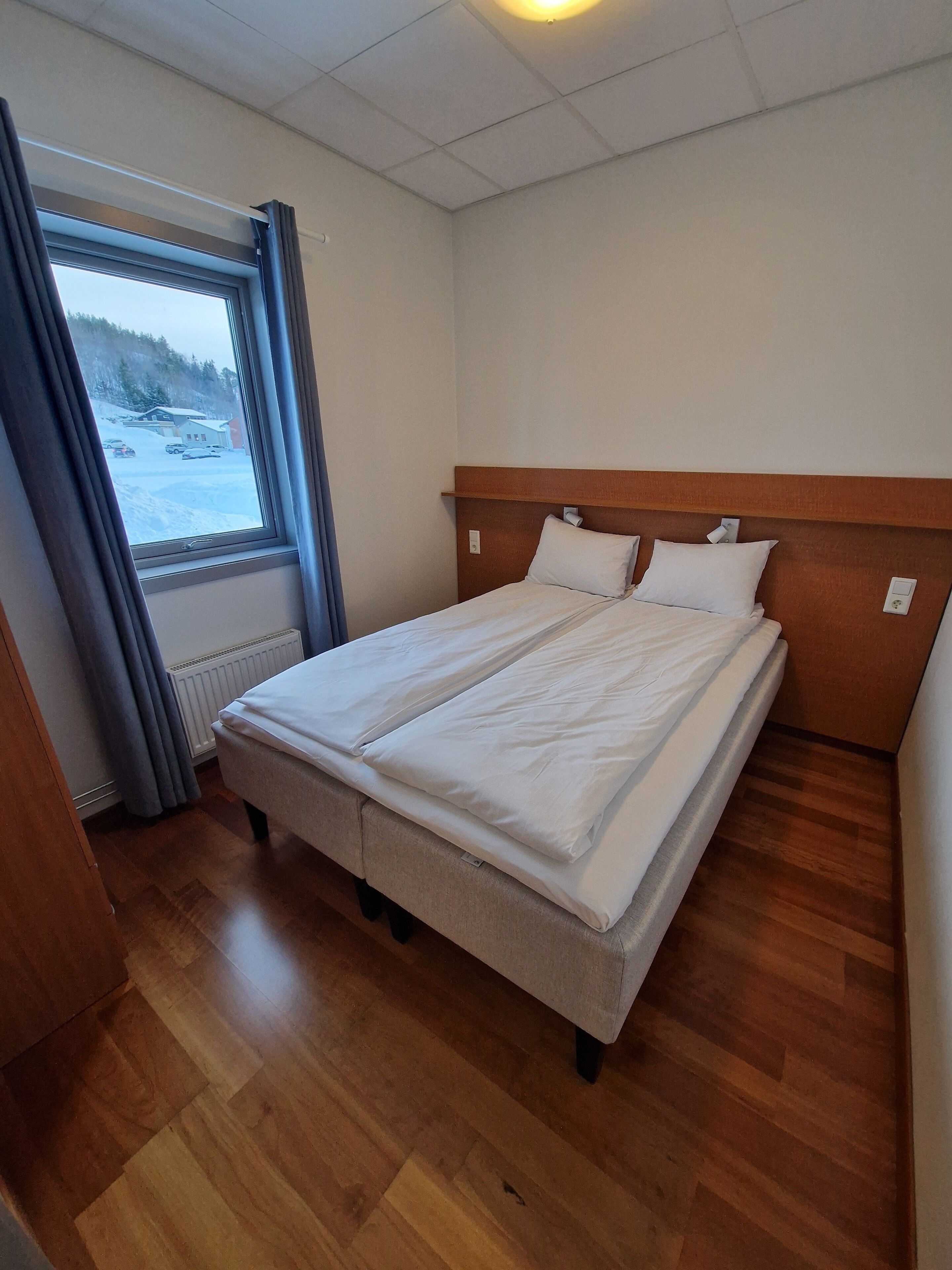 family room | 1 bedroom, pillow-top beds, blackout curtains, soundproofing