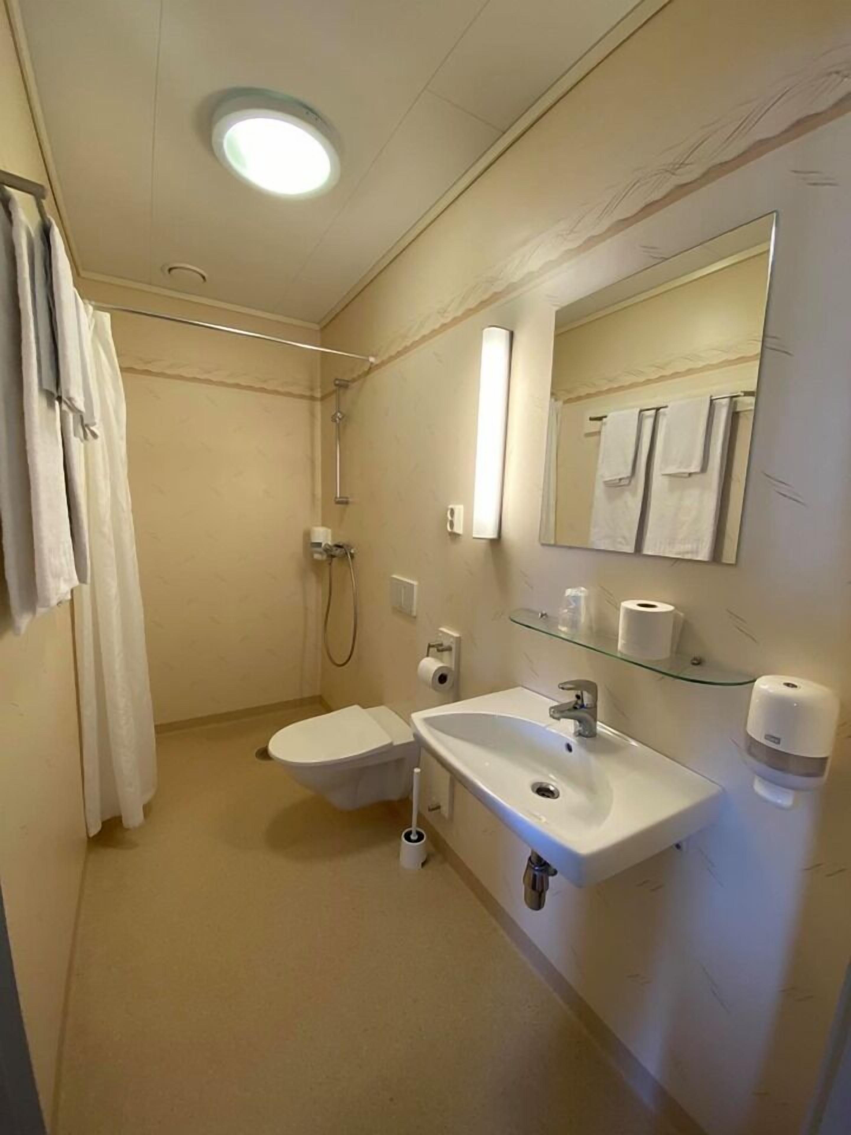 shower, rainfall showerhead, hair dryer, heated floors