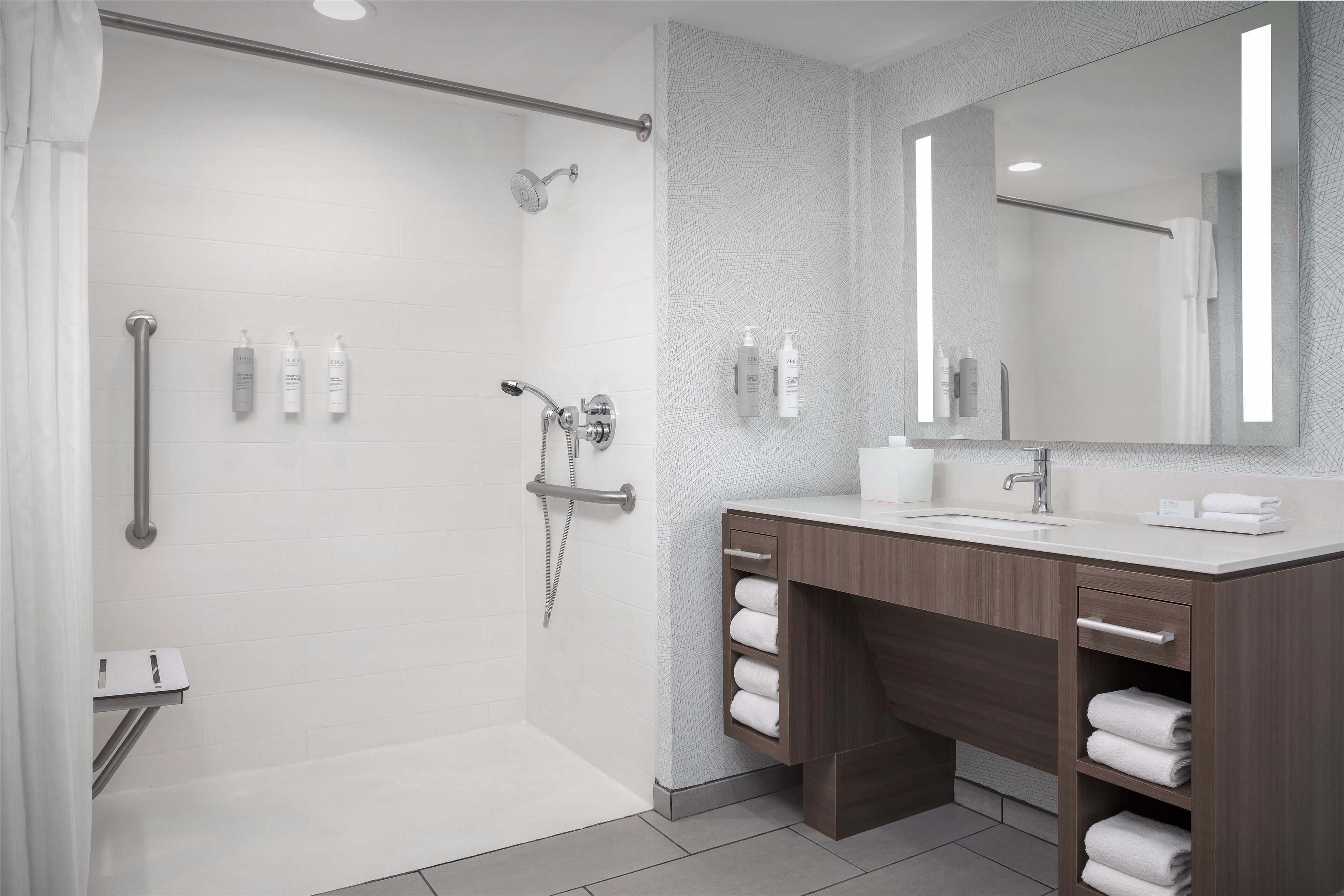 suite, 1 king bed, accessible, non smoking (mob/hearing acc w/ roll-in shower) | bathroom shower