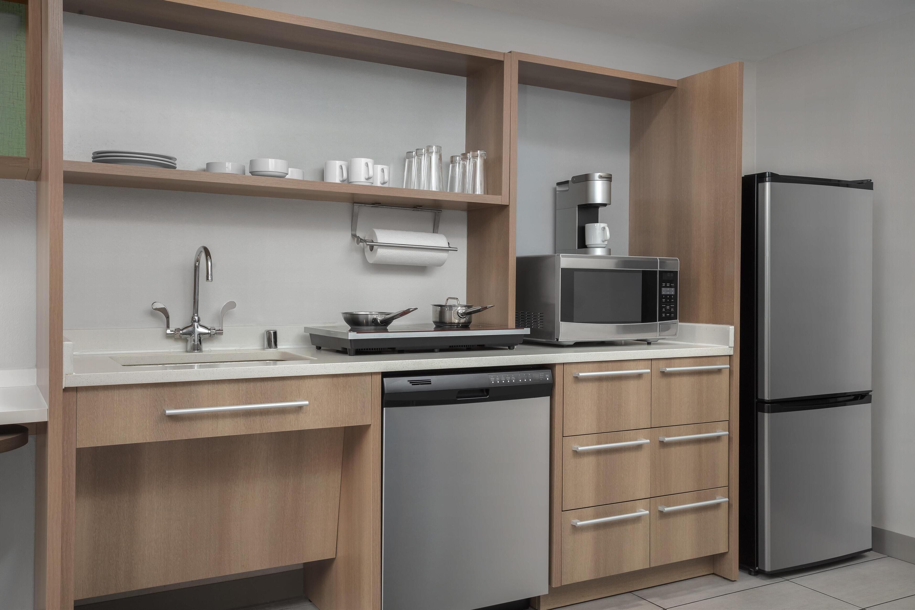 full-sized fridge, microwave, dishwasher, coffee/tea maker