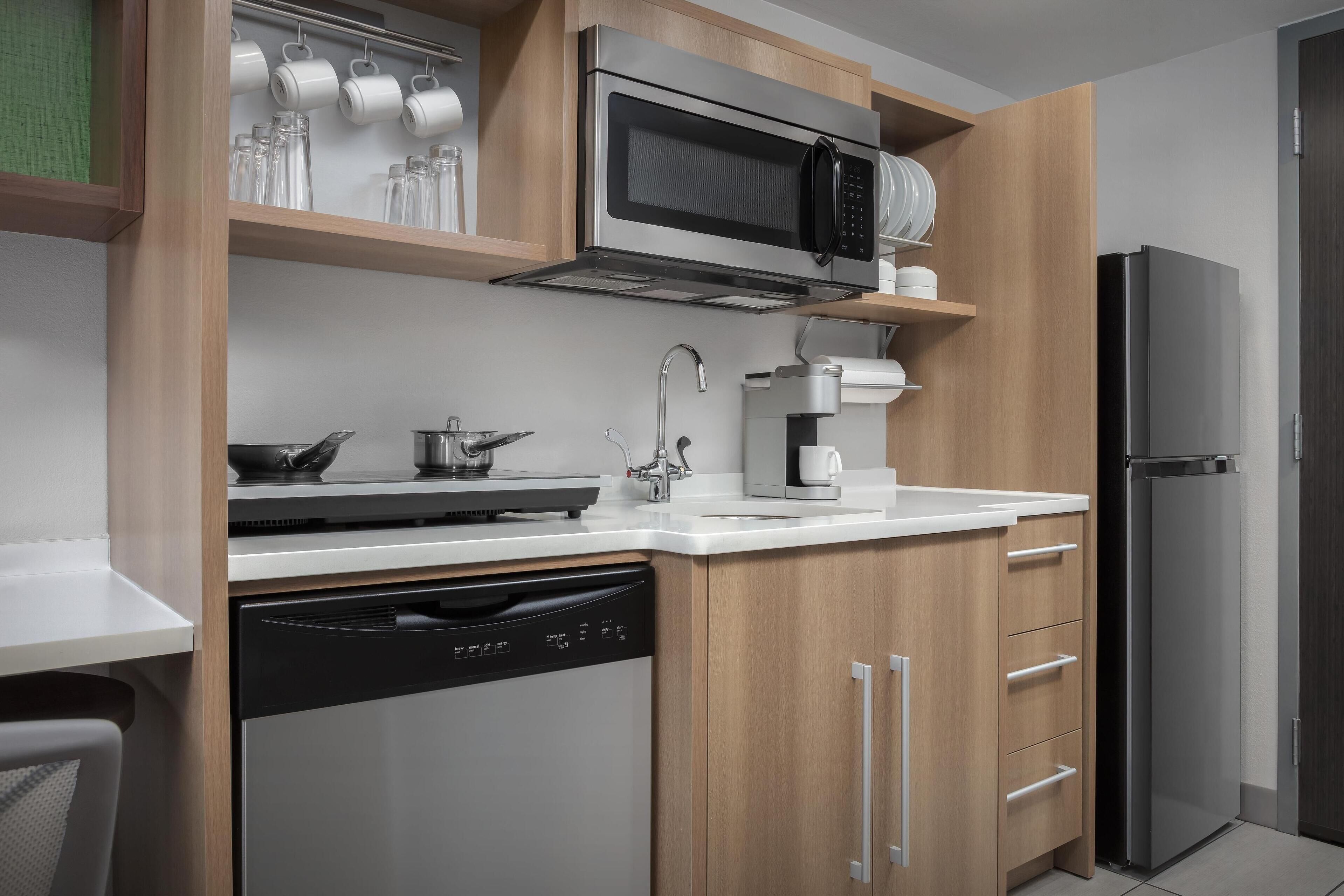 full-sized fridge, microwave, dishwasher, coffee/tea maker