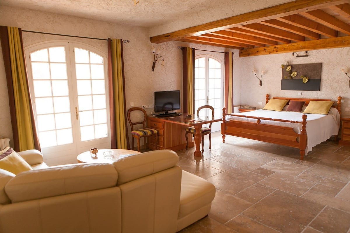 family suite, garden view | 1 bedroom, select comfort beds, minibar, individually decorated