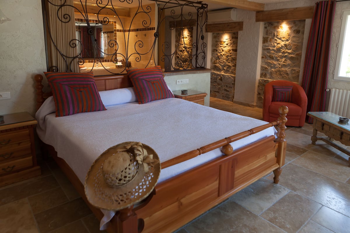 family suite, garden view | 1 bedroom, select comfort beds, minibar, individually decorated