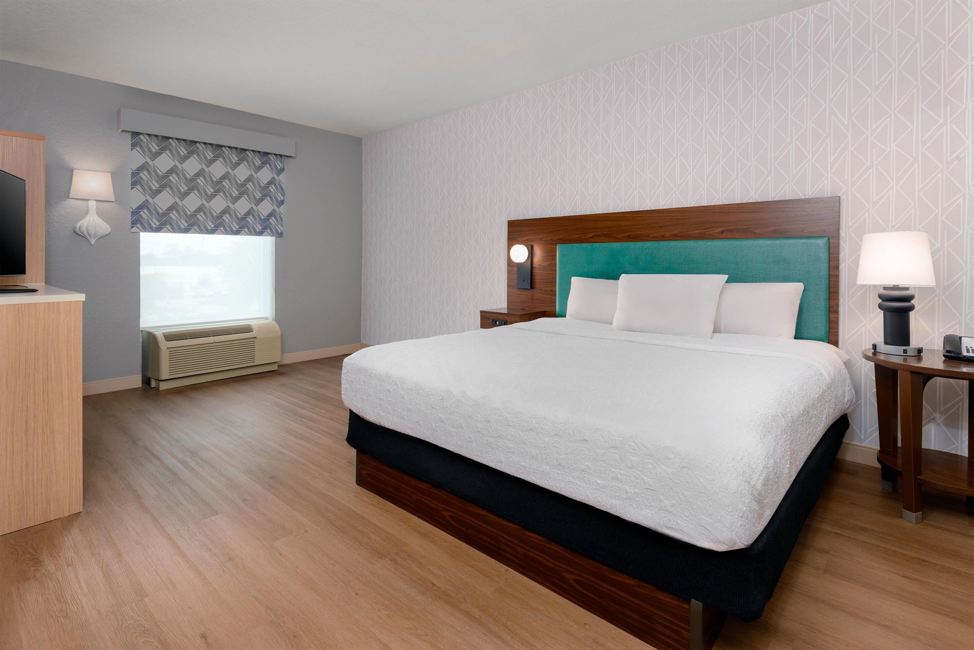 Desk, laptop workspace, blackout curtains, iron/ironing board