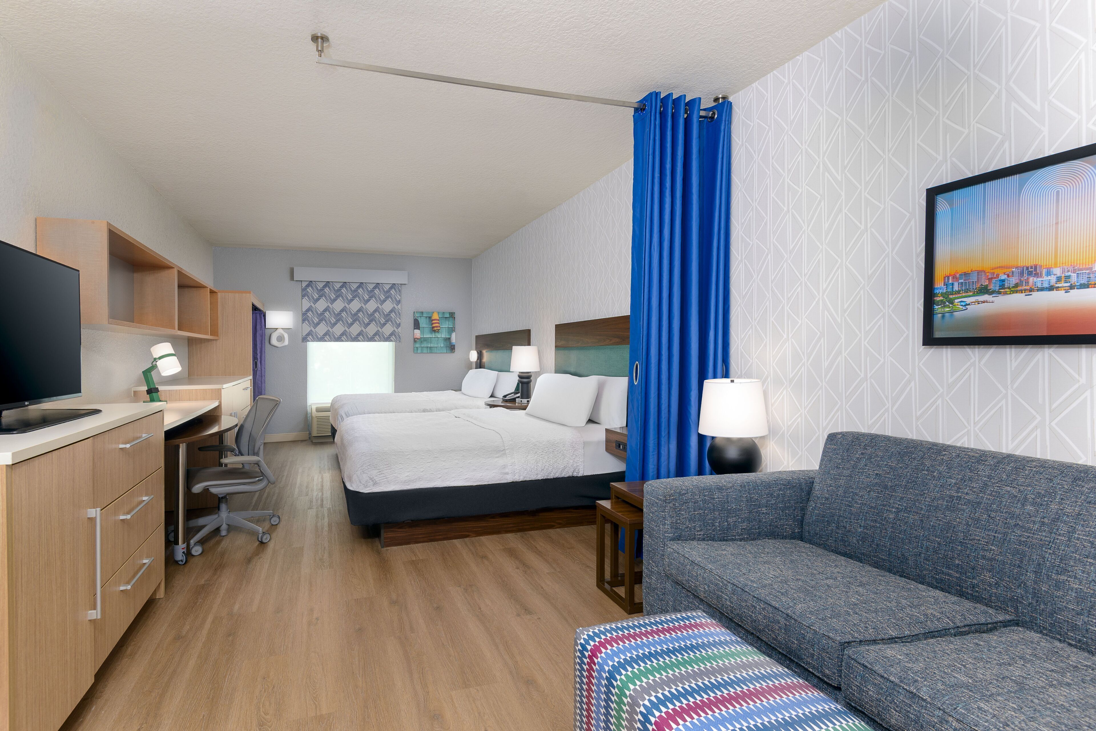 desk, laptop workspace, blackout curtains, iron/ironing board