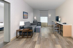 Desk, laptop workspace, blackout drapes, iron/ironing board