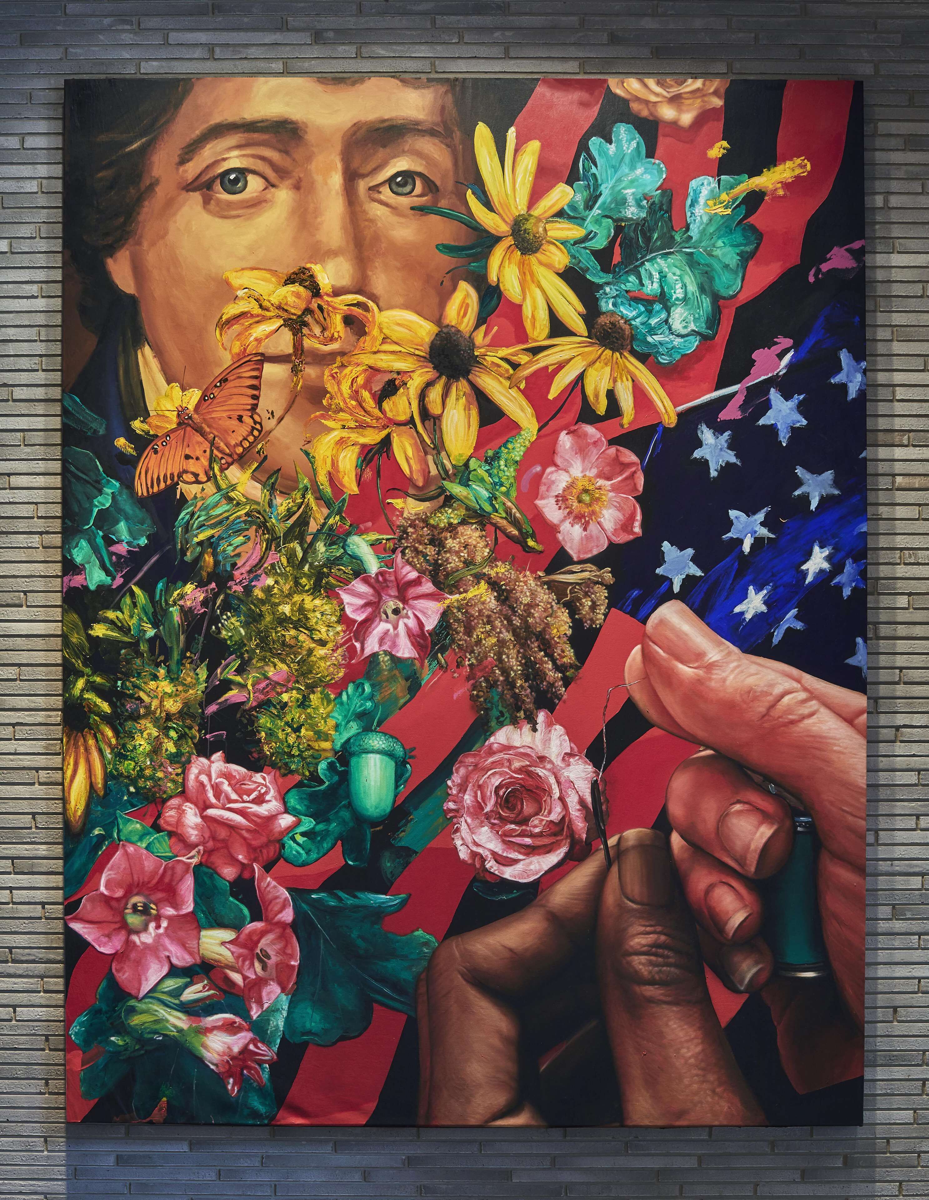 A mural with a person's face, vibrant flowers, and an American flag.