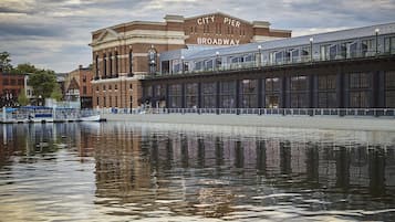 A waterfront view with a building labeled "City Pier Broadway."