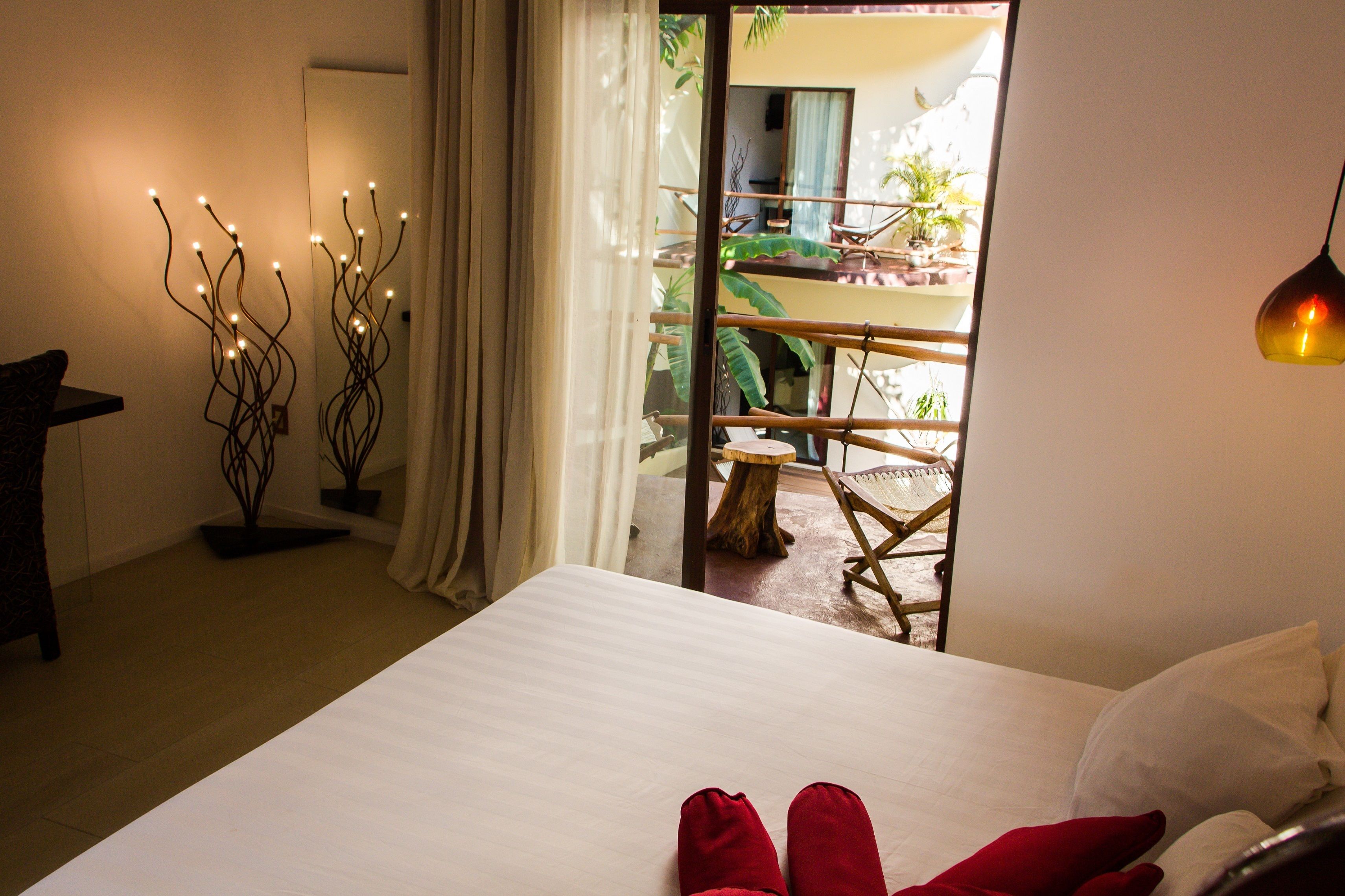 deluxe double room, 1 king bed, balcony, pool view | 1 bedroom, minibar, in-room safe, individually decorated