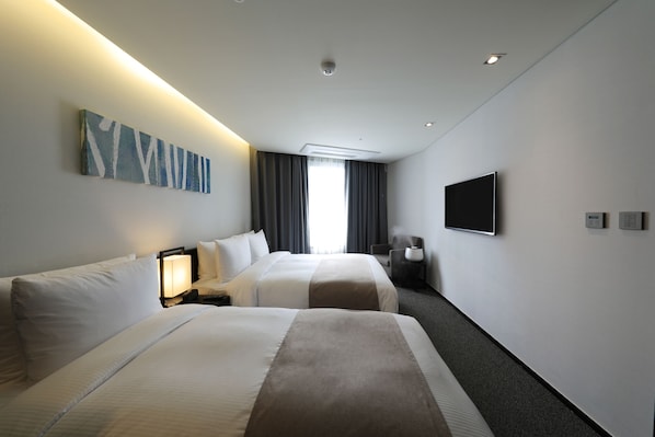 Junior Suite, Multiple Beds | In-room safe, desk, free WiFi, bed sheets - Ramada Encore Seoul Magok (Seoul)