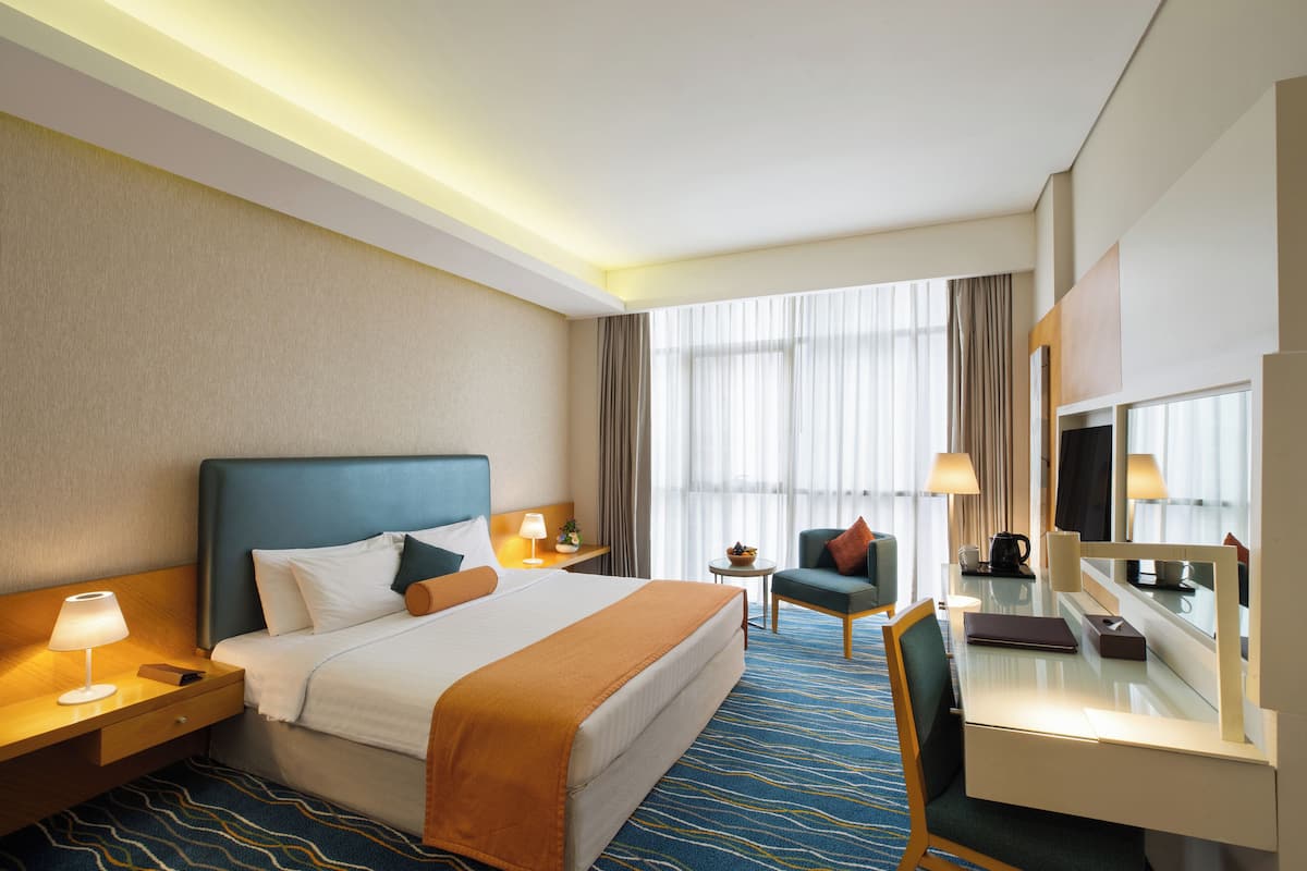 Superior King Room | Minibar, in-room safe, desk, blackout curtains