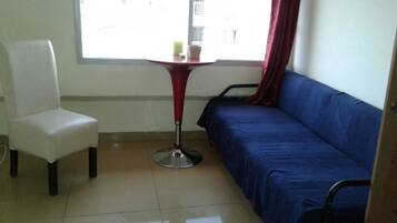 Departamento, vista al lago | Área de sala de estar