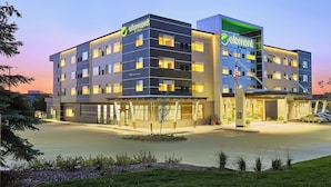 A hotel with a modern design, featuring multiple floors and a prominent entrance. - Element by Marriott West Des Moines (West Des Moines)