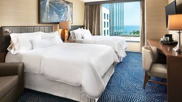 Premium bedding, down duvets, pillow-top beds, in-room safe