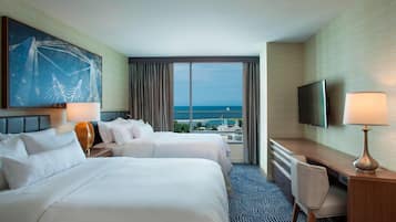 Premium bedding, down duvets, pillow-top beds, in-room safe