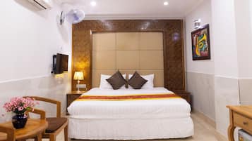 Deluxe Room | Premium bedding, minibar, desk, laptop workspace