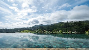 Outdoor pool, open 7:00 AM to 9:00 PM, sun loungers