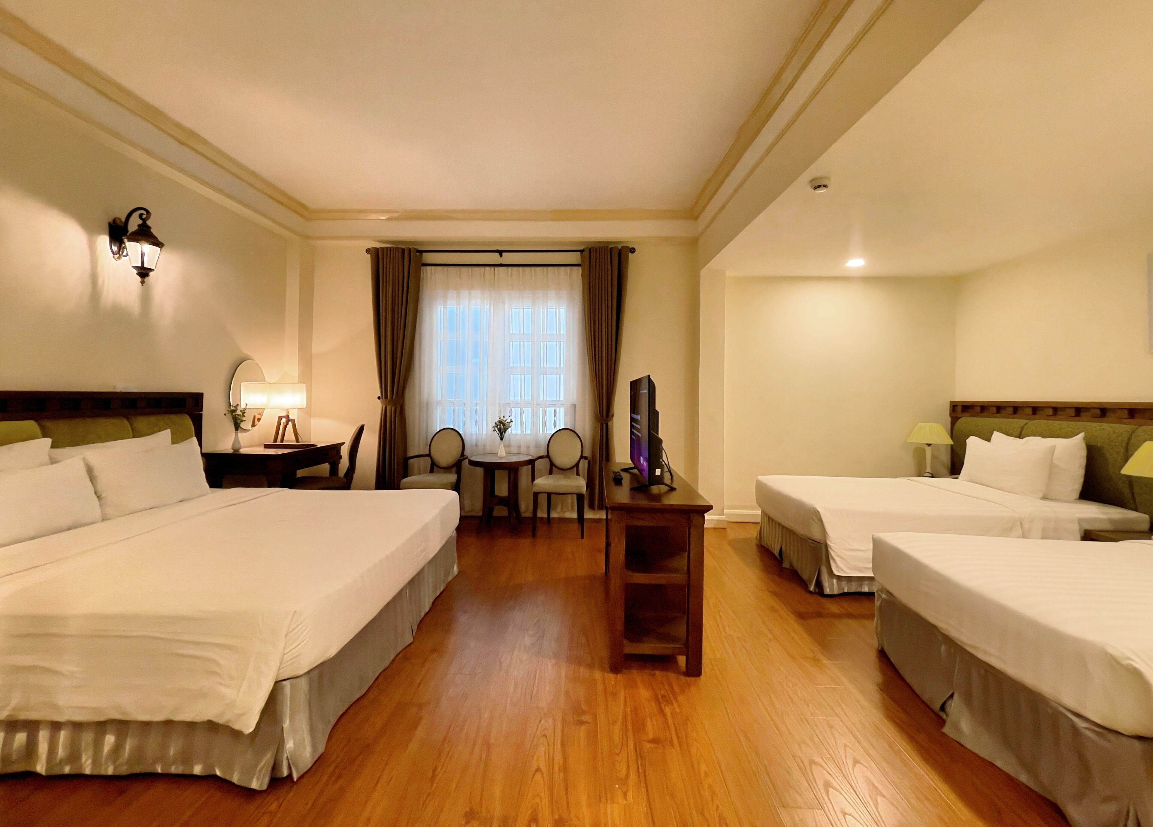 Superior Quadruple Room | Minibar, in-room safe, desk, blackout curtains