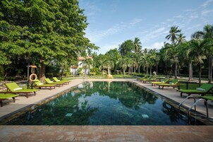 Outdoor pool, open 7 AM to 9 PM, sun loungers