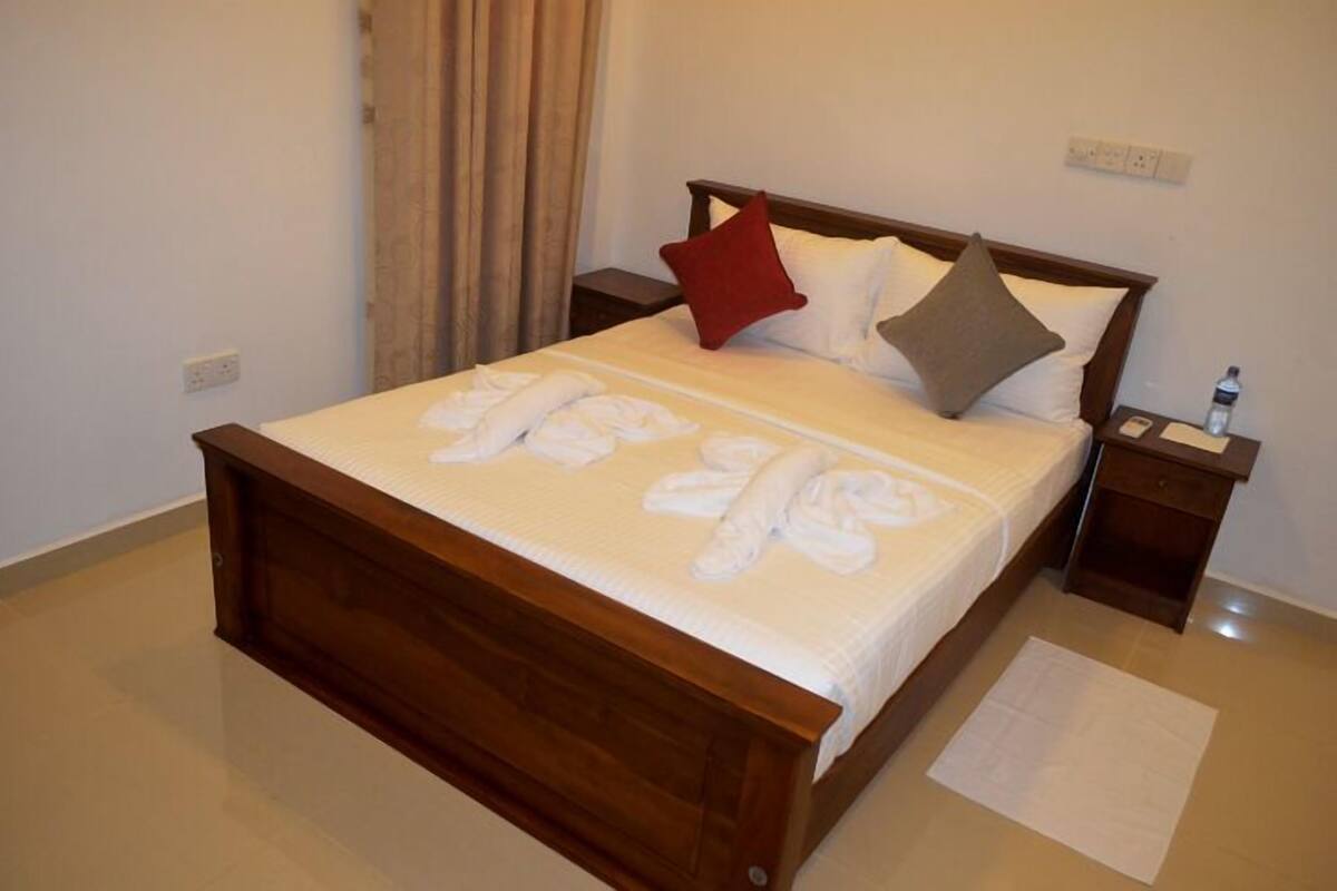 Deluxe Quadruple Room | Premium bedding, minibar, in-room safe, desk