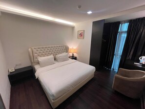 Superior Room, 1 King Bed | Desk, soundproofing, iron/ironing board, free WiFi - Capital O 91074 Grand World Hotel (Masai)