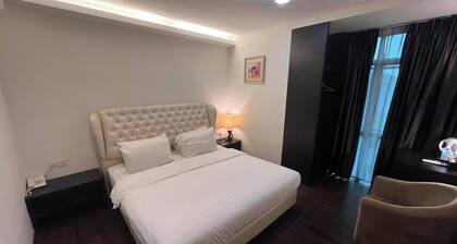 Capital O 91074 Grand World Hotel