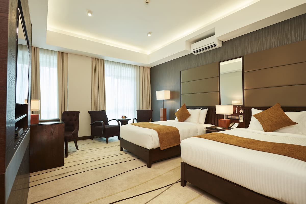 deluxe twin room | 1 bedroom, minibar, in-room safe, desk