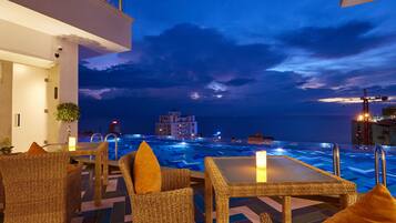 Outdoor pool, open 8:00 AM to 8:00 PM, sun loungers, lifeguards on site