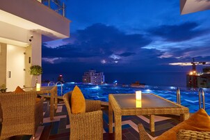 Outdoor pool, open 8:00 AM to 8:00 PM, sun loungers, lifeguards on site