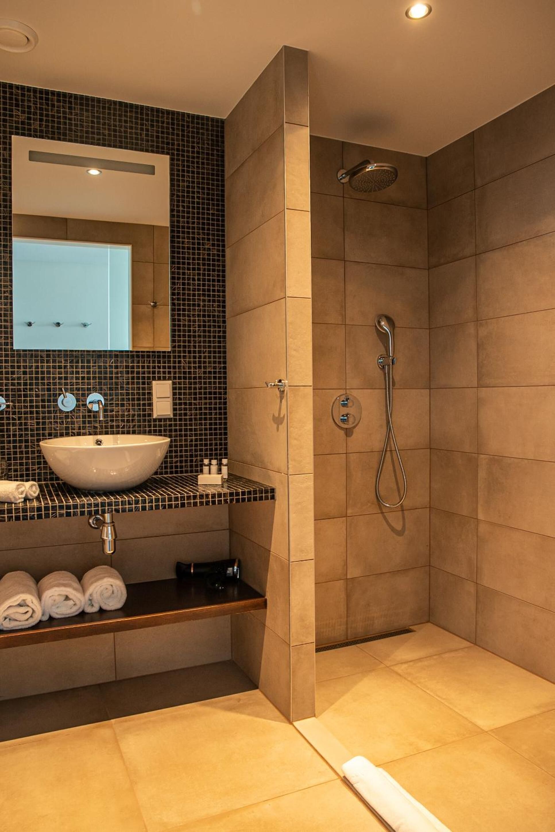 separate bathtub and shower, jetted bath, rainfall showerhead