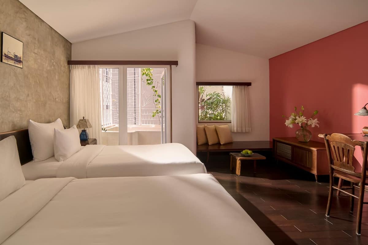 Serene Corner Balcony Twin Room | Free minibar items, in-room safe, blackout drapes, soundproofing