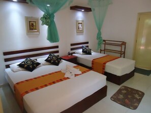 Triple AC Room | Premium bedding, in-room safe, desk, iron/ironing board - Flower Seven Hotel (Anuradhapura)