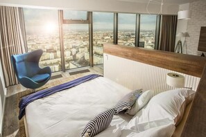 Superior Apartment | Living area | 50-inch LED TV with cable channels, TV - Sky Tower Apartments (Wroclaw)