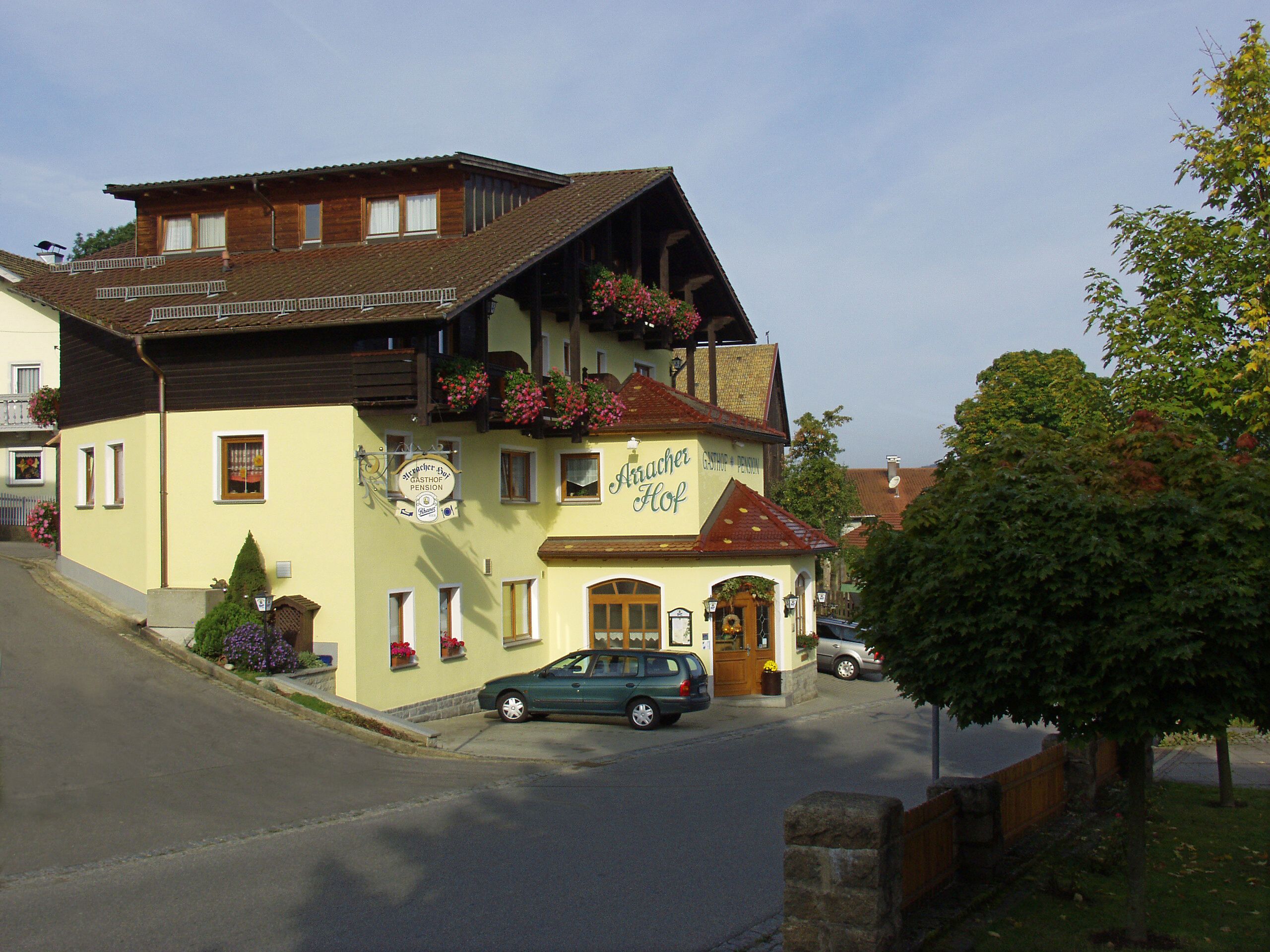 A traditional building with a sign reading "Gasthof Hof".
