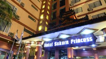 A hotel named "Hotel Sakura Princess" with a tiled entrance area and a visible entrance door.