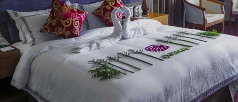 Egyptian cotton sheets, premium bedding, down comforters, minibar