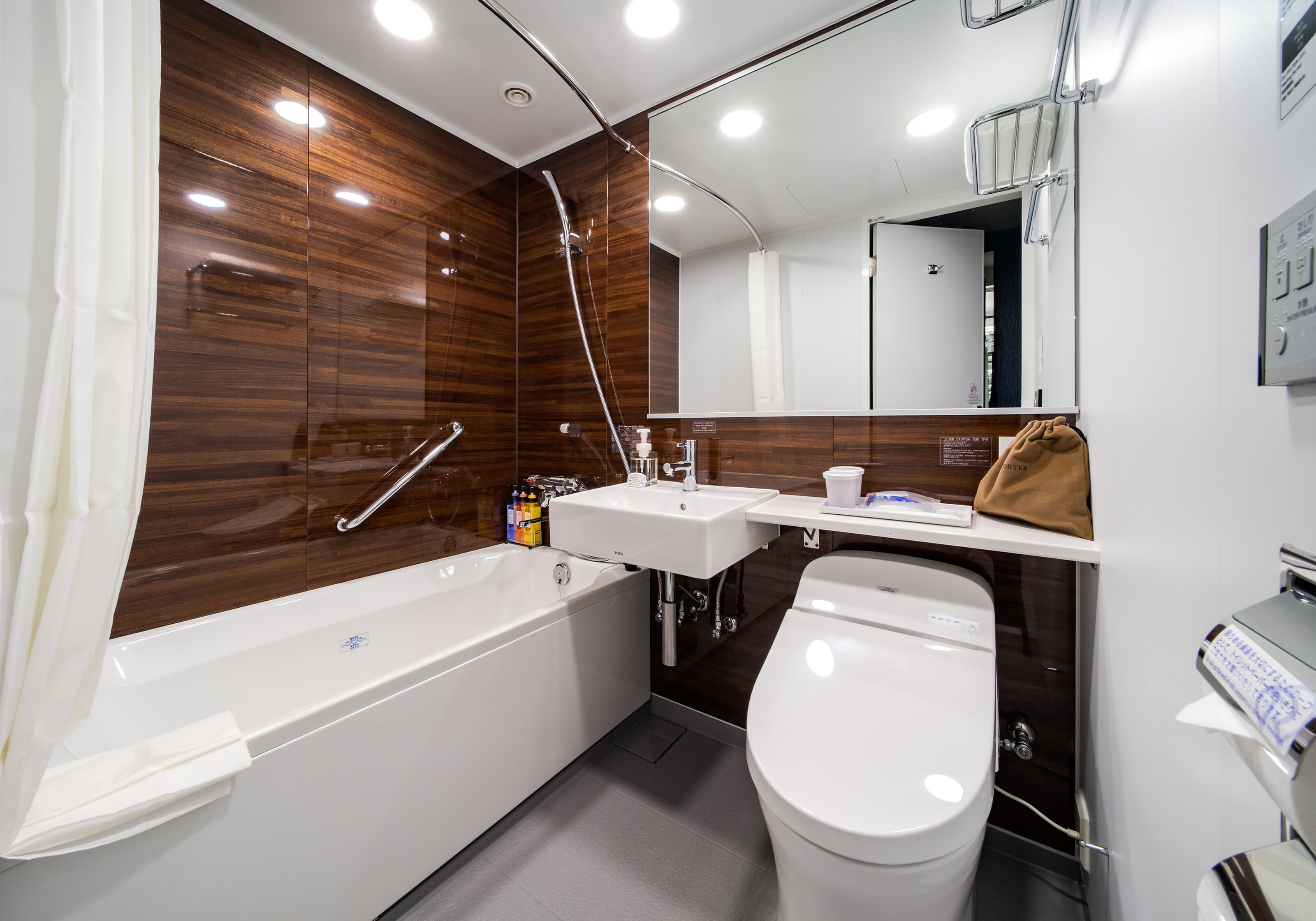 shower, hair dryer, bathrobes, slippers