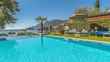 Outdoor pool, open 8:30 AM to 6:30 PM, pool umbrellas, sun loungers