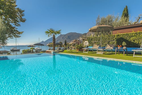 Outdoor pool, open 8:30 AM to 6:30 PM, pool umbrellas, pool loungers