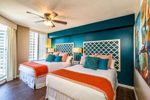 A hotel room with two beds, a ceiling fan, and a large window with blinds. - ST MAARTEN 808 3 Bedroom Holiday Home by Five Star Properties (Destin)