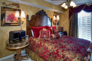 A bedroom with a large bed, ornate headboard, and decorative lamps. - MAISON PAR LEAU 3 Bedroom Holiday Home by Five Star Properties (Destin)