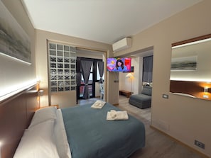 1 dormitori, cobrellits, minibar i caixa forta a l'habitació