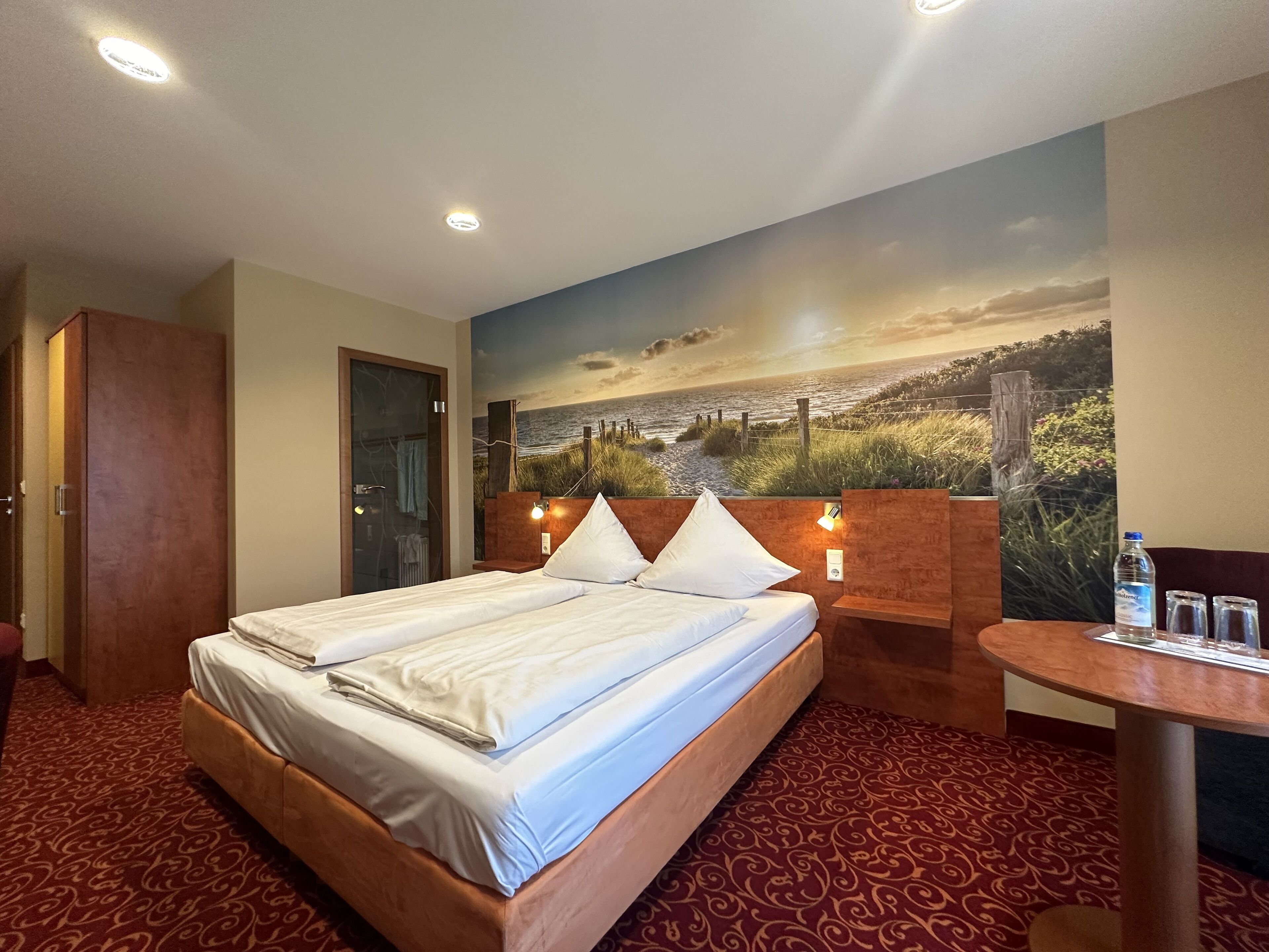 triple room, balcony | living area | flat-screen tv