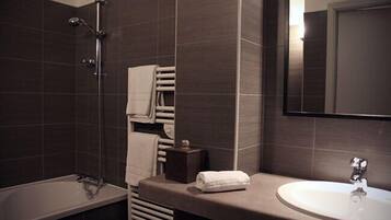 Shower, free toiletries, hair dryer, towels