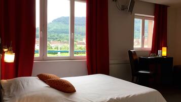 Desk, blackout drapes, soundproofing, iron/ironing board