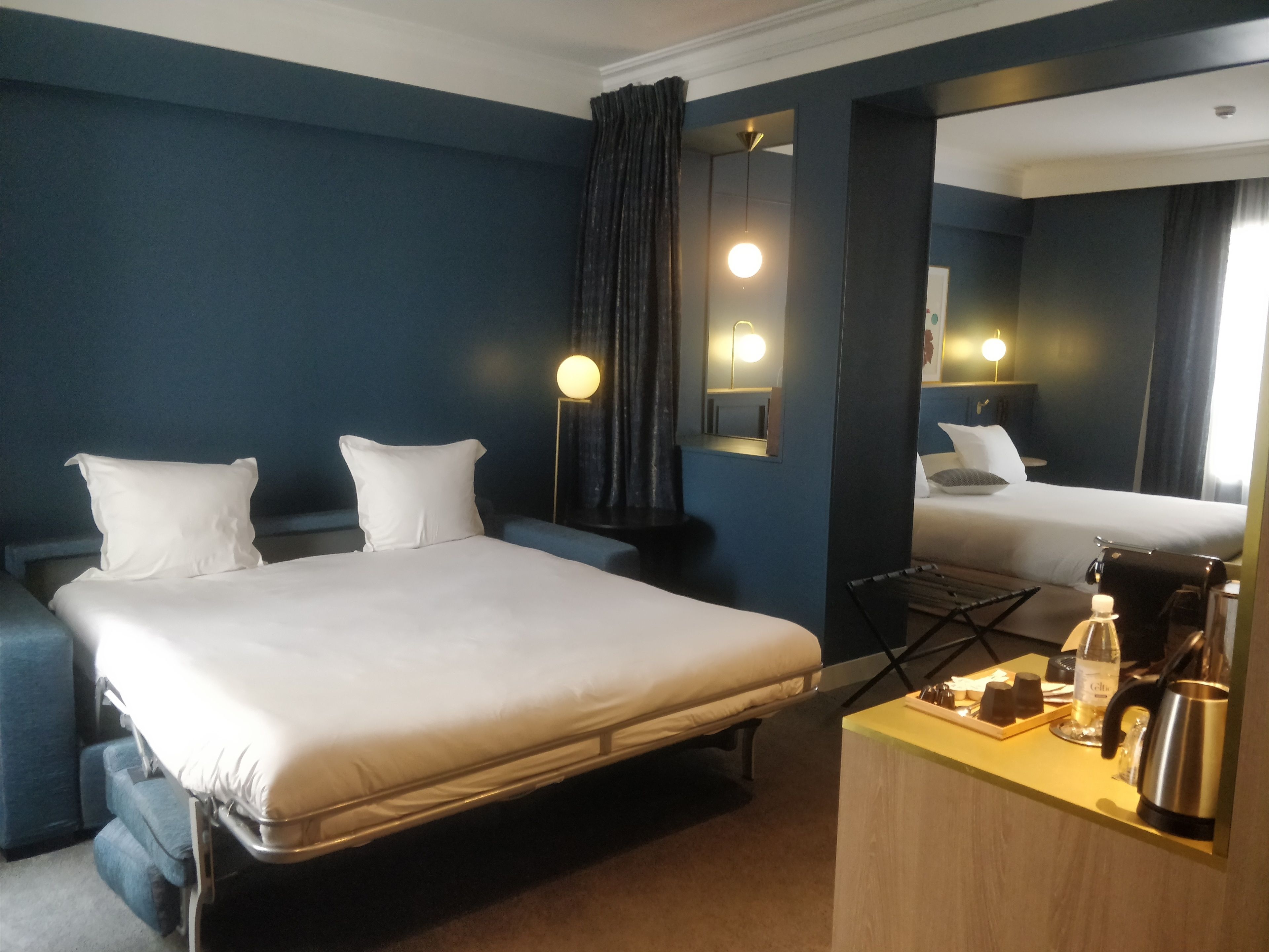 family suite, queen bed and sofa, ground floor | 1 bedroom, minibar, in-room safe, desk