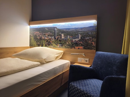 Comfort-Einzelzimmer, Nichtraucher | Verdunkelungsvorhänge, kostenloses WLAN, Bettwäsche
