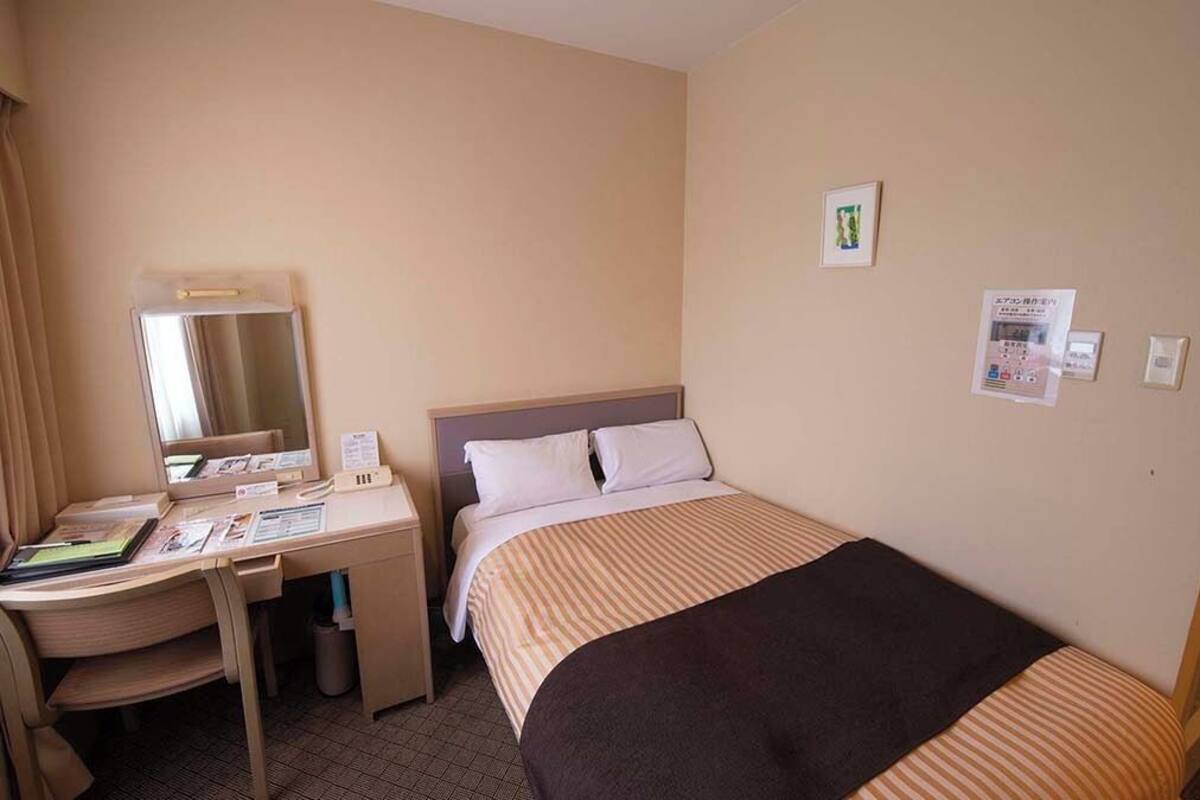 Down comforters, desk, iron/ironing board (on request), WiFi (free)